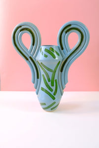 DECO VASE IN BABY BLUE WITH GRASS GREEN SHAPES