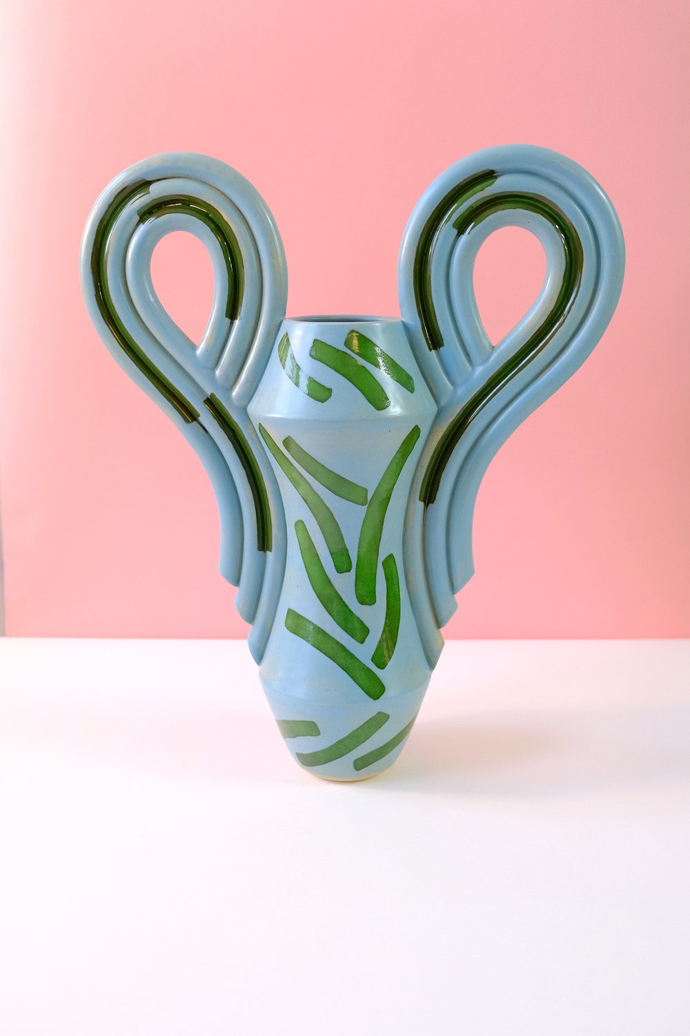 DECO VASE IN BABY BLUE WITH GRASS GREEN SHAPES